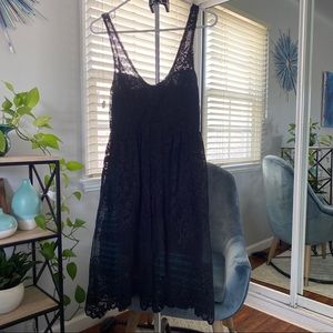 Free People sleeveless black lace dress.